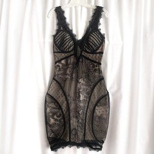Bebe cocktail dress (mini dress) black lace on ivory lining. Size XS